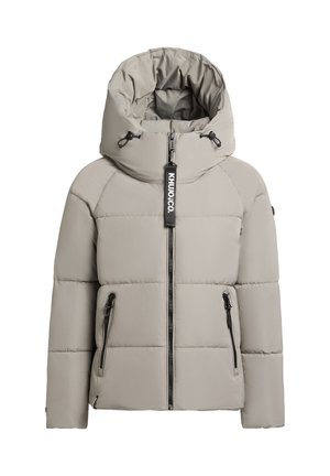 Helehall hallitusest padjakate, millel on kõrge krae, tõmbluku ette, kaks külgtaskut ja mustad tõmblukkaktsendid. Krael on logo silt.