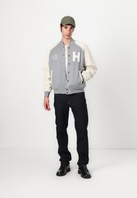 Tommy Hilfiger MIX MEDIA VARSITY UNISEX - Chaquetas bomber - grey