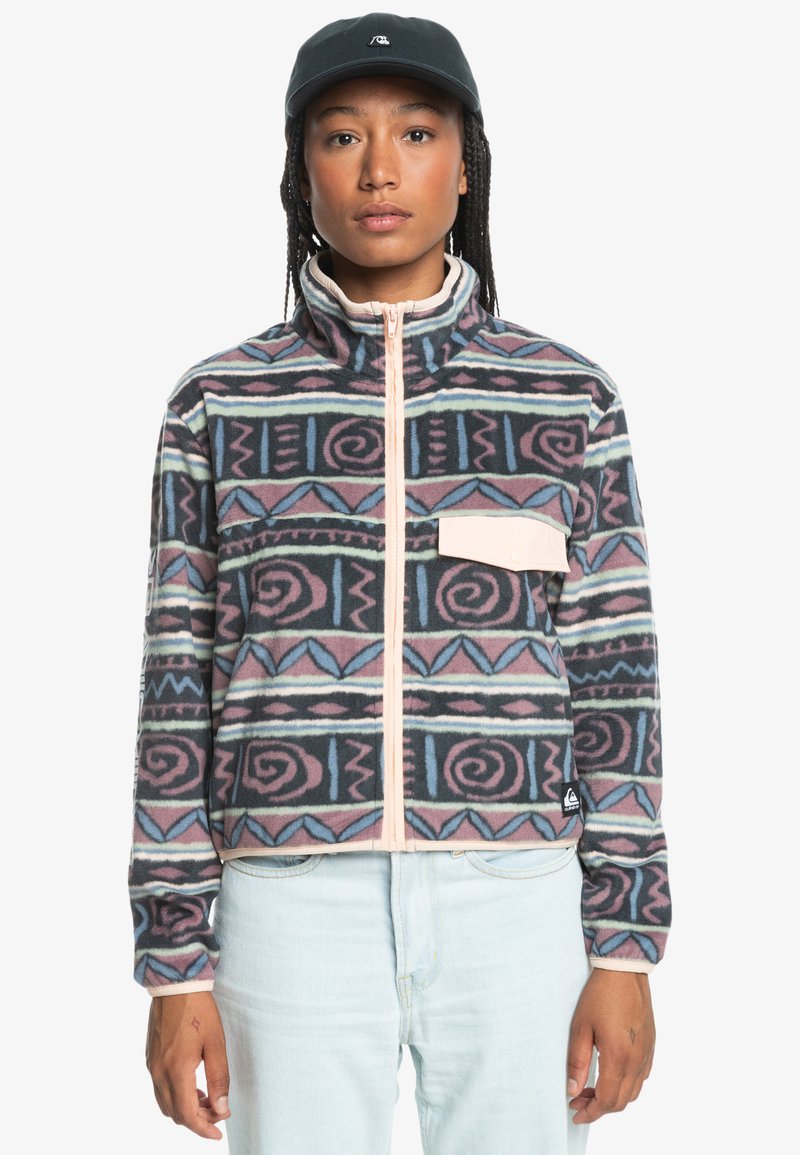 Fleece jacket featuring a geometric pattern in pink, blue, and black, with a high collar, full zipper, and a front chest pocket.