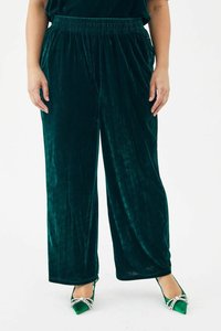 Donkergroene fluwelen wijde pijpen met een elastische tailleband. Heeft een zachte textuur en valt soepel, ideaal voor casual kleding.