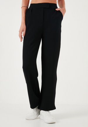 REGULAR FIT - Trousers - black