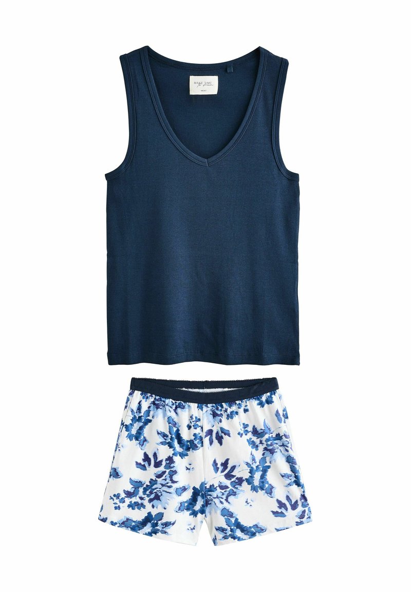 Navy ribbed tank top with a V-neck and matching white shorts featuring a blue floral pattern and an elastic waistband.