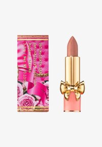 Satin-finish lipstick in a rose-nude shade. Tube features gold hardware and a pink base with a gold bow accent. Box has a floral design.