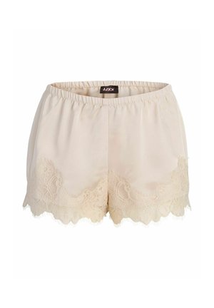 Pantalones cortos de satén color crema con cintura elástica y adornos de encaje en el dobladillo, etiquetados como JJXX en el interior de la cintura.