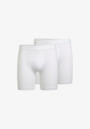 Witte boxershorts van een zachte katoenmix, met een elastische tailleband met reliëfbranding. Glad aanvoelend, met een lengte tot halverwege de dij.