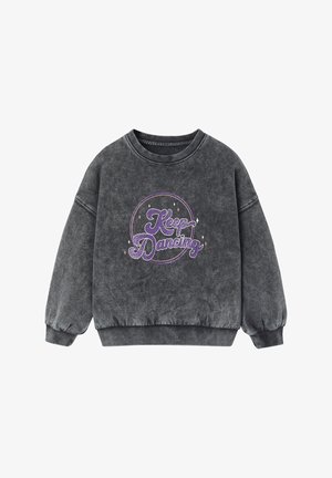 Dark gray long-sleeve sweatshirt with ribbed cuffs and hem, featuring purple glitter text "Keep Dancing" inside a circular design on the front.