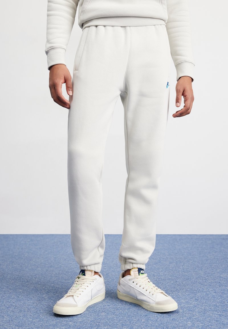 Nike Sportswear Träningsbyxor - beige