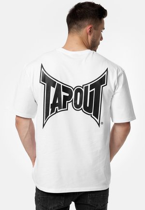 White cotton t-shirt featuring a large black "TAPOUT" logo on the back. It has short sleeves and a crew neck design.