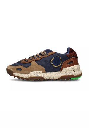 Suede and leather sneaker featuring a blue and brown colorway, speckled midsole, and contrasting green outsole. Detailed stitching and logo accent.