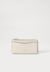 NEW YORK ZIP CARD CASE - Wallet - chalk