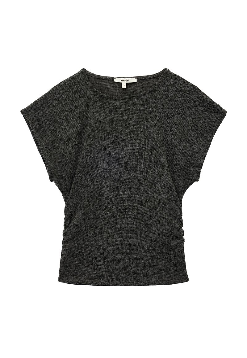 Top gris oscuro hecho de tela texturizada. Presenta mangas cortas, un escote redondo y lados fruncidos para un ajuste relajado.