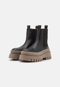 Tamaris Botines con plataforma - black