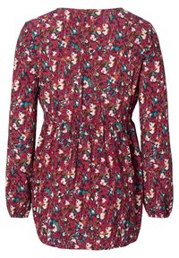 Blusa com padrão floral de fundo maroon, mangas longas, decote redondo e cintura franzida, apresentando pequenas flores coloridas e detalhes em verde.