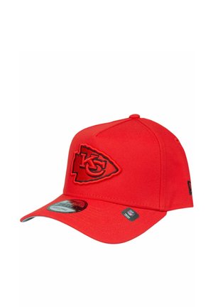 Red Kansas City Chiefs cap with curved brim, embroidered team logo on front, and NFL tags on brim and side.