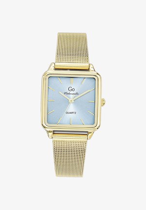 Montre en quartz carrée avec un cadran bleu clair, accents dorés et un bracelet en maille dorée texturée. Présente des marqueurs d'heure fins et un logo.