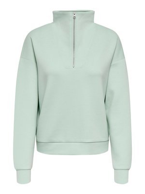 Sweat-shirt vert menthe avec col montant zippé, coupe décontractée, épaules tombantes et poignets et ourlet côtelés, confectionné en tissu doux.