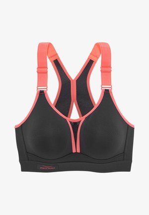 Sujetador deportivo negro con acentos en coral, paneles de malla y tirantes ajustables. Diseñado con una forma estructurada y de soporte.