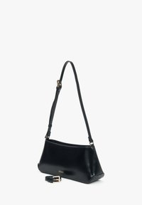 Black leather shoulder bag with a glossy finish, slim shape, and gold hardware accents. Includes an adjustable strap.