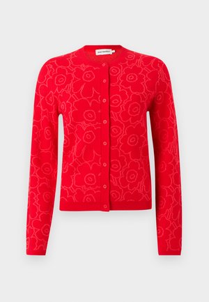 Czerwony dzianinowy kardigan z kwiatowym wzorem, okrągłym dekoltem i zapięciem na guziki. Długie rękawy oraz ściągacze na mankietach i dolnym brzegu.