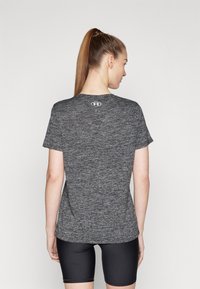 Under Armour TECH - TWIST - Sports T-shirt - black/white