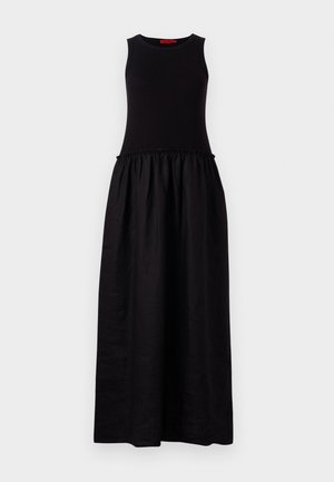Black maxi dress featuring a fitted sleeveless top, gathered waist, and flowing skirt made from lightweight fabric. Simple and versatile design.
