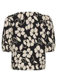 Blouse noire avec un motif floral crème, dotée de manches bouffantes et d'une coupe décontractée. Le tissu semble texturé avec des détails de couture visibles.