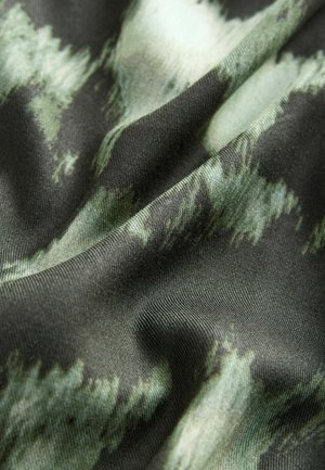 Fabric with a soft texture, featuring a dark green base and abstract lighter green patterns, showcasing a flowing, wrinkled appearance.