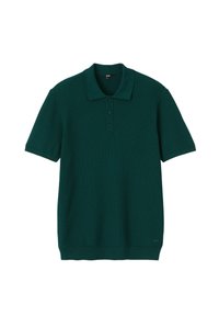 Polo shirt court à manches courtes de couleur vert foncé, fabriqué en tricot de coton texturé, doté d'une patte de boutonnage à trois boutons et d'un col côtelé.