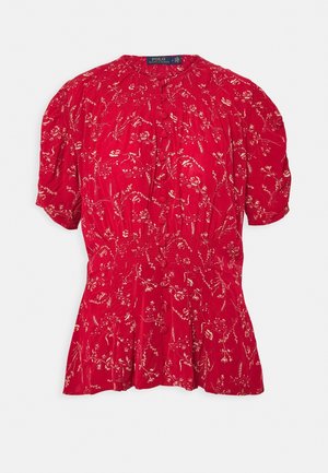 Czerwona bluzka z krótkim rękawem w kwiatowy wzór, z zapinanym na guziki przodem, marszczoną talią i okrągłym dekoltem, marki Polo Ralph Lauren.