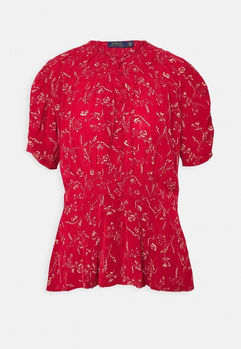 Blouse rouge à manches courtes avec motif floral, devant boutonné, taille froncée et encolure ronde, par Polo Ralph Lauren.