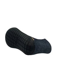 Suola di scarpa in gomma nera con un motivo di presa testurizzato, combinata con materiale in feltro grigio nella parte superiore, progettata per comfort e supporto.
