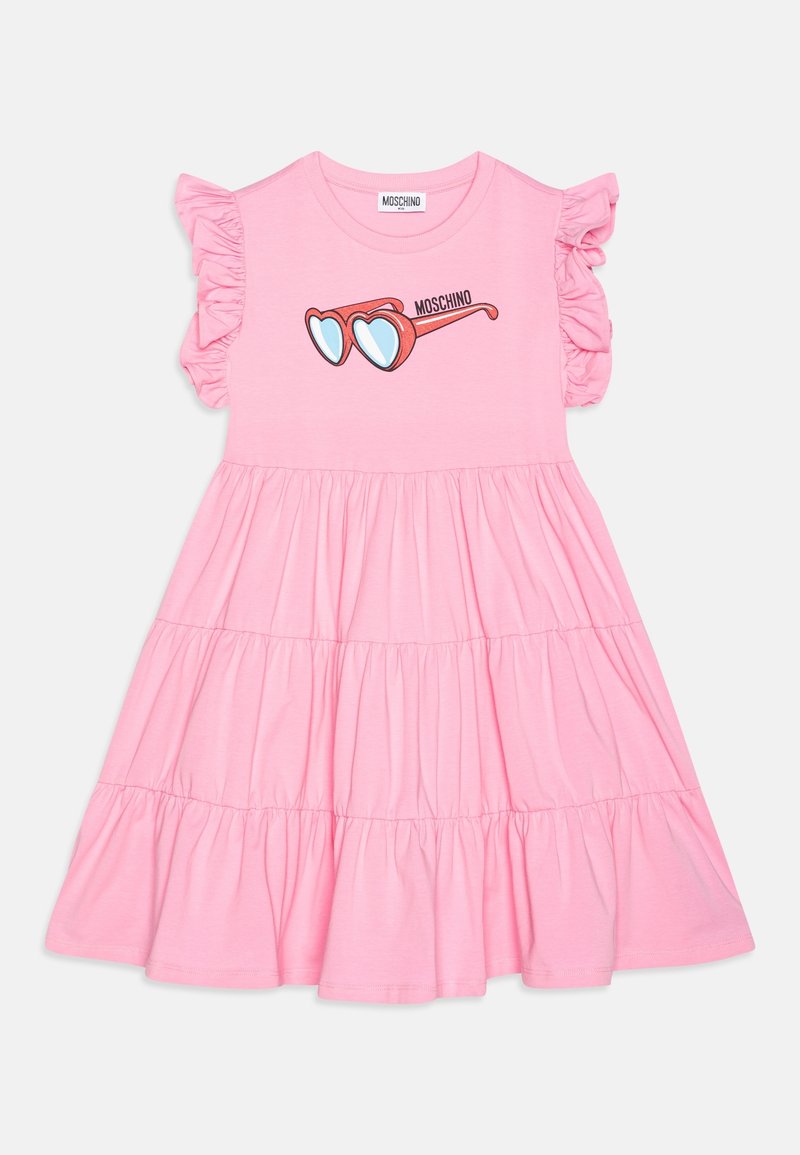 Robe en coton rose avec manches volantées, jupe à volants et graphisme de lunettes de soleil en forme de cœur. Comprend un col rond et le logo de la marque.
