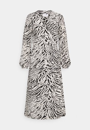 Robe portefeuille à manches longues avec imprimé zèbre noir et blanc, dotée d'un col en V et de poignets froncés.