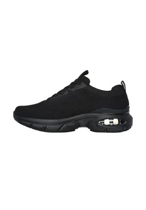 Zapatilla deportiva negra con parte superior de punto, suela acolchada, cojín de aire visible en el talón y lengüeta en la parte trasera.