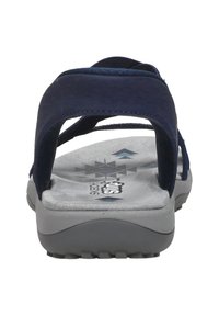 Sandalo blu navy con una morbida soletta grigia imbottita, dotato di due cinghie e una suola in gomma testurizzata per una migliore presa.