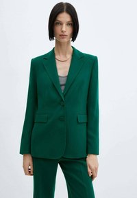 Groene maatpak blazer van glad materiaal, met een enkele knoopsluiting, bedeelde revers en zijzakken.