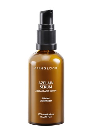 Braune Pumpflasche des Junglück Azelain Serums, bezeichnet mit 10 % Azelainsäure und 1 % Zink PCA, entwickelt zur Reduzierung von Hautunreinheiten.