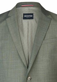 Grijze blazer van een geweven stof met een subtiel patroon, met een notch lapel, een enkele knoopsluiting en een bedrukte voering.