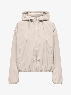 Veste à capuche beige clair avec fermeture éclair frontale, capuche ajustable par cordon, poches latérales, poignets et ourlet élastiques.