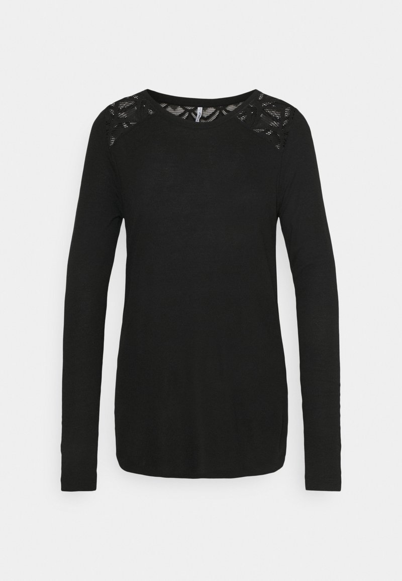 Svart långärmad skjorta med spetsdetaljer på axlarna och halsringningen, med rund hals och figurnära silhuett.