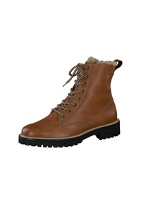 Hnědá kožená kotníková bota s texturovaným povrchem, šněrováním a syntetickou kožešinou uvnitř. Obsahuje odolnou černou podrážku a dekorativní stehy.