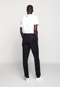 Michael Kors Tygbyxor - dark blue