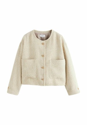 Beige textured jacket with a round neckline, two front pockets, and button closures. Made of woven fabric, featuring subtle color variations.