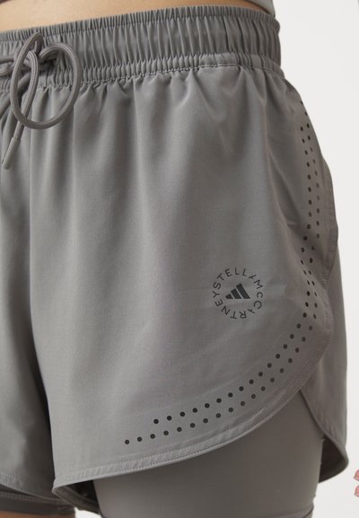 adidas by Stella McCartney Šorti “divi vienā” - deep dove