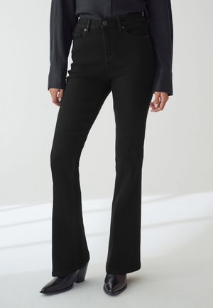 Next HOURGLASS SUPER SOFT - Bootcut jeans - black