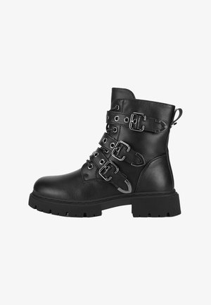Schwarzer Leder-Stiefelette mit drei Schnallenriemen, Schnürung vorne, dicker profilierter Sohle und Zuglasche hinten.