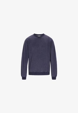 Temno modra majica iz mehkega blaga, s krožnim izrezom, dolgimi rokavi ter rebrastimi manšetami in robom. Minimalistična zasnova; brez vzorcev ali dodatkov.