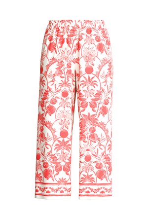White wide-leg pants with red floral and fruit pattern and an elastic waistband on a plain background.
