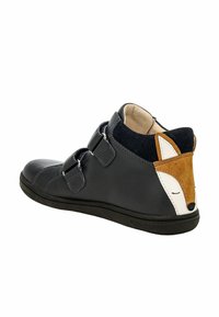 Stivale alla caviglia in pelle blu navy con due cinturini regolabili, caratterizzato da un design di volpe marrone e bianco sul tallone. Suola in gomma nera.