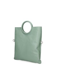 Borsa tote in pelle verde con forma quadrata, manico circolare e dettagli in acciaio inox. Texture liscia con design minimalista.